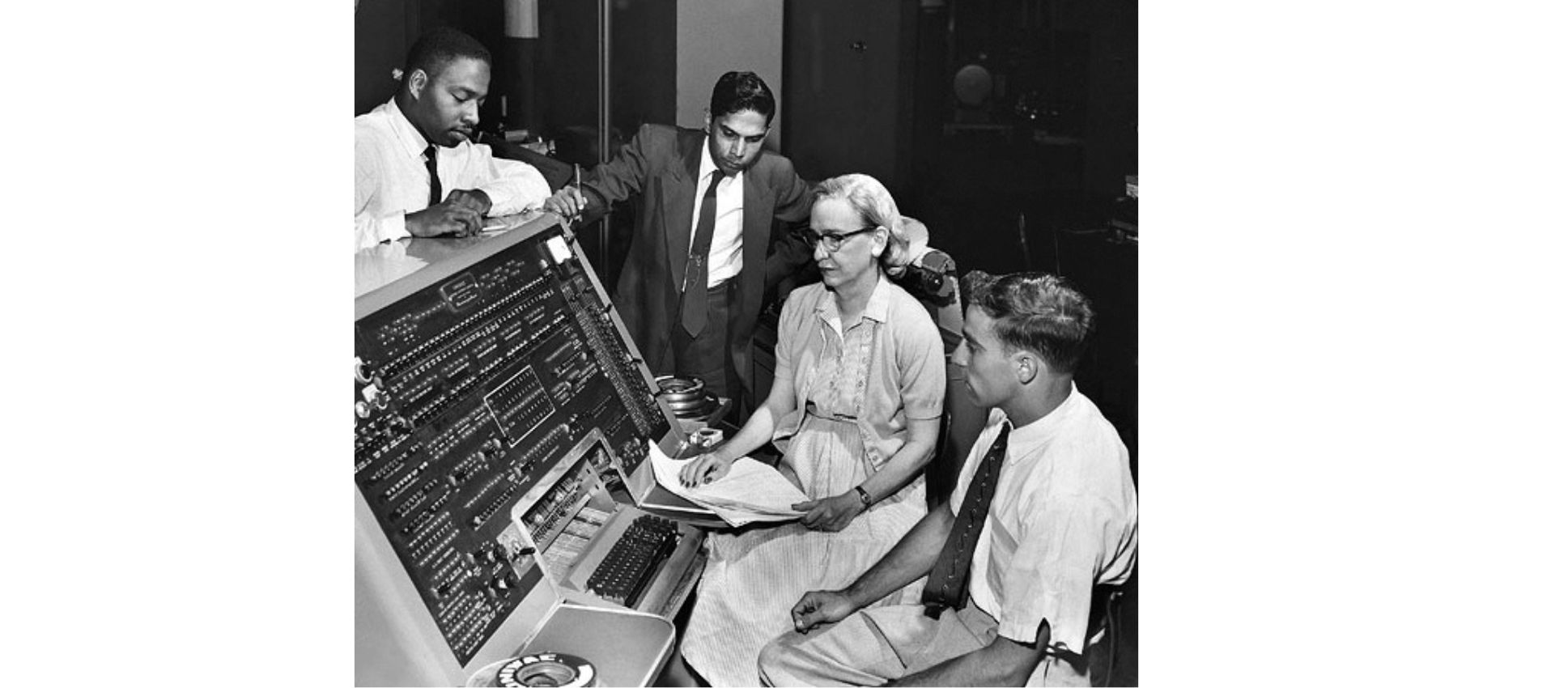 Grace Hopper at the UNIVAC keyboard in June 1957 (attribution: Flickr: Grace Hopper and UNIVAC, CC BY 2.0 via Wikimedia Commons; source: https://commons.wikimedia.org/wiki/File:Grace_Hopper_and_UNIVAC.jpg) Grace Hopper at the UNIVAC keyboard, June 1957